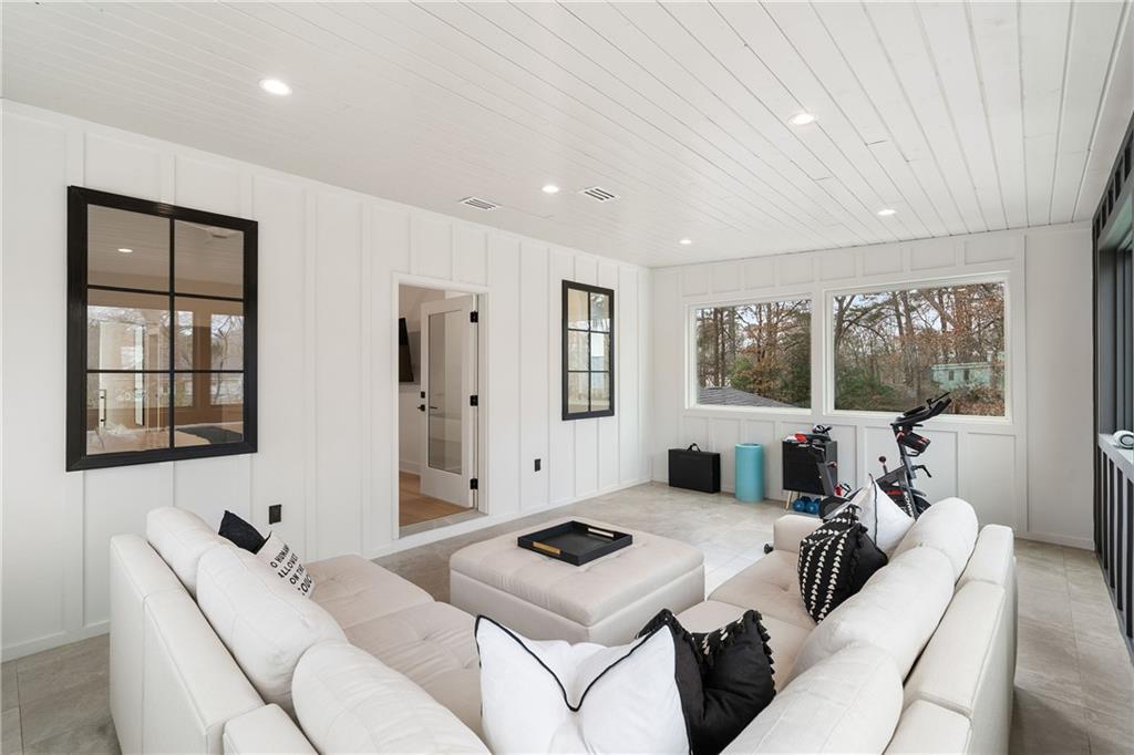 185 Pebble Trail Alpharetta, GA 30009 - Photo 40 of 55 a living room with furniture and a large window