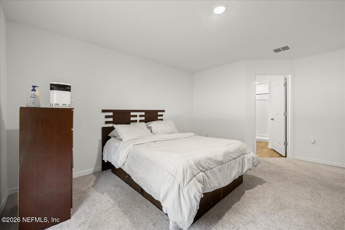 671 Live Oak Loop Crescent City, FL 32112 - Photo 17 of 38 23-Master Bedroom to Master Bathroom