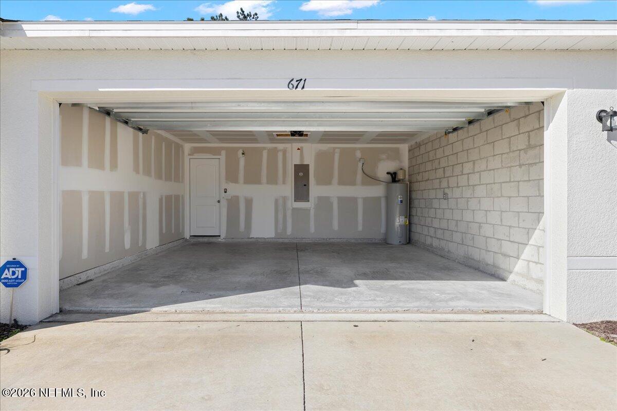 671 Live Oak Loop Crescent City, FL 32112 - Photo 29 of 38 a view of a garage