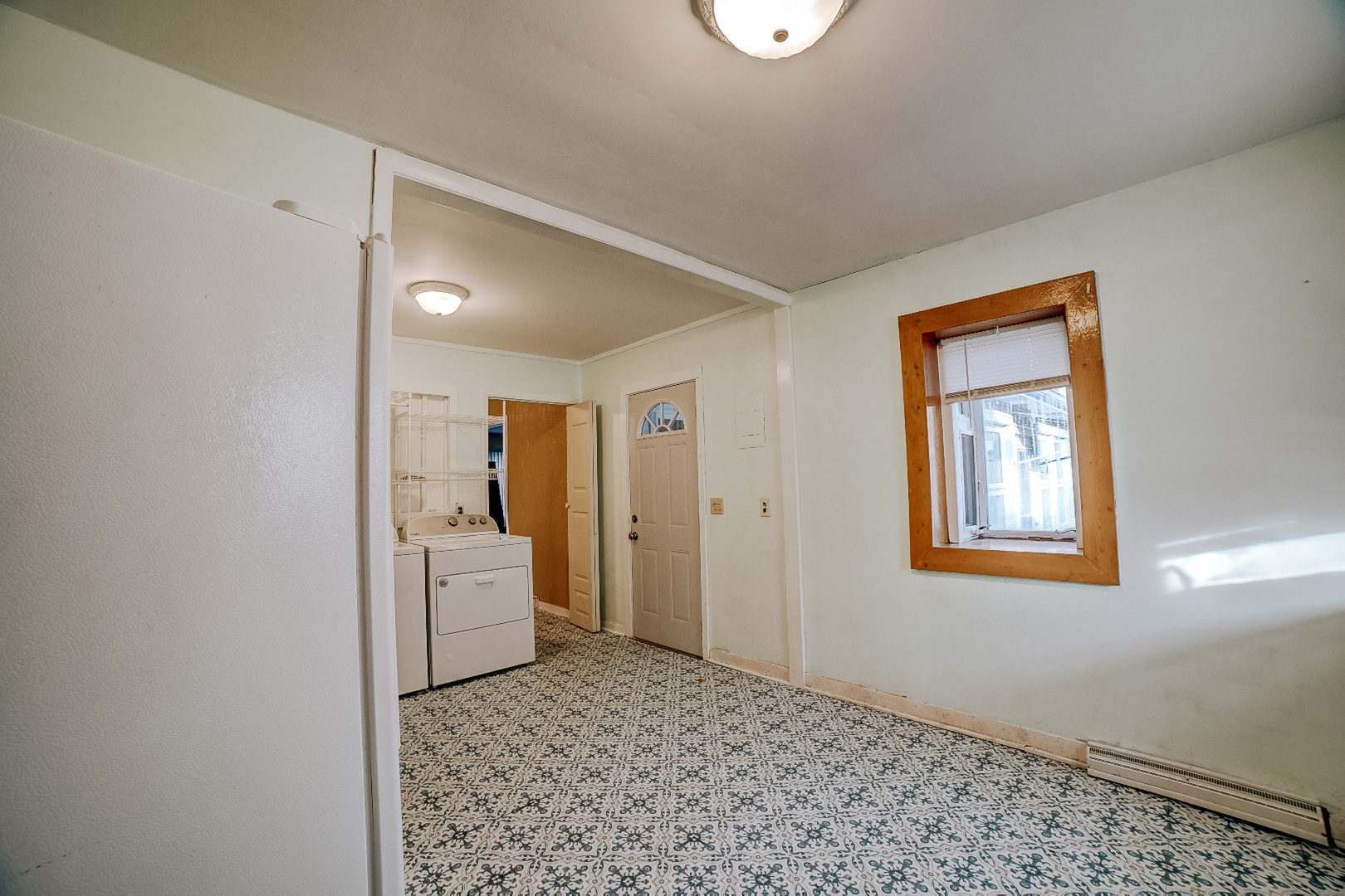 602 East Cherry Street Watseka, IL 60970 - Photo 12 of 29 a view of a hallway with closet and wooden floor
