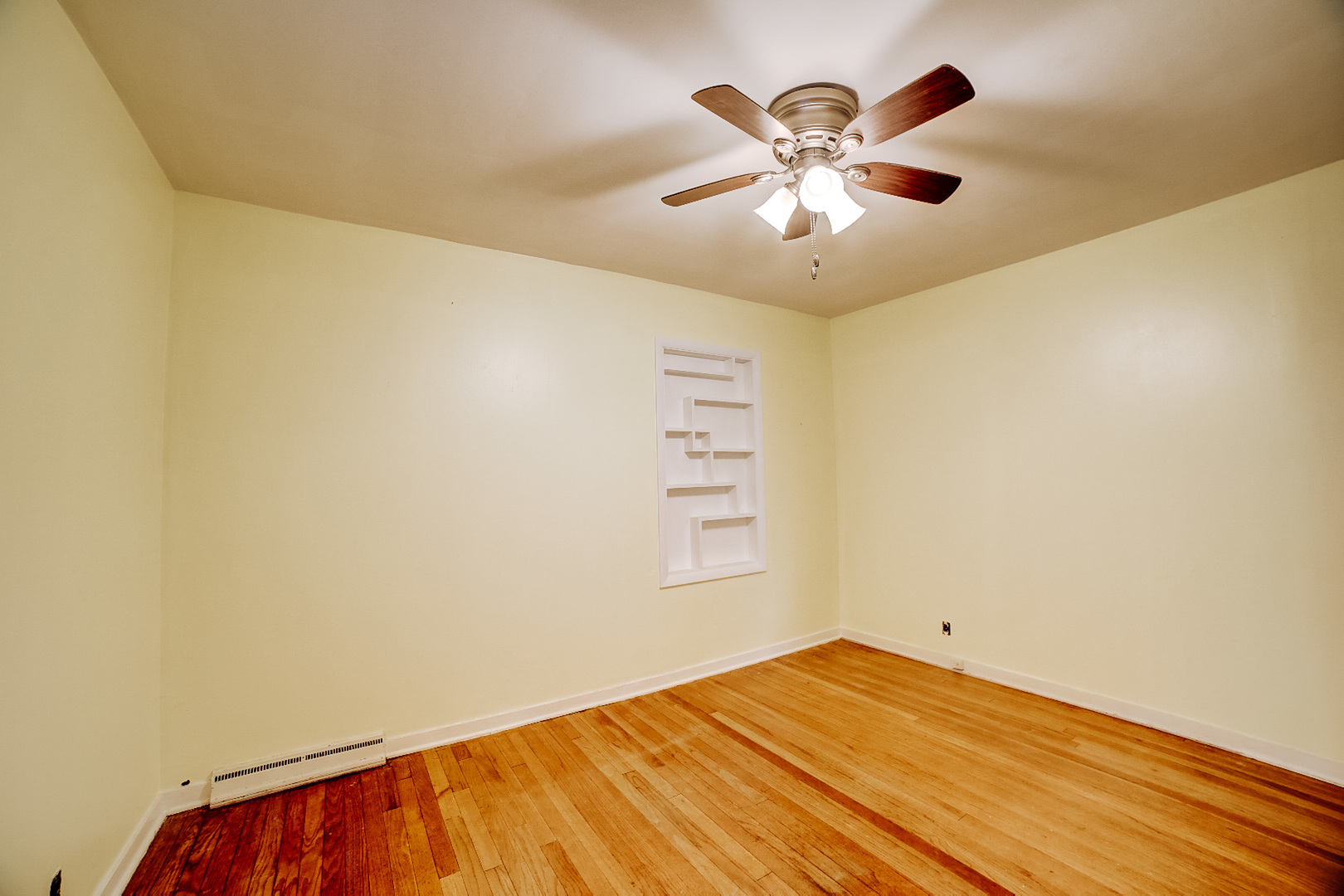 602 East Cherry Street Watseka, IL 60970 - Photo 19 of 29 a view of empty room with wooden floor