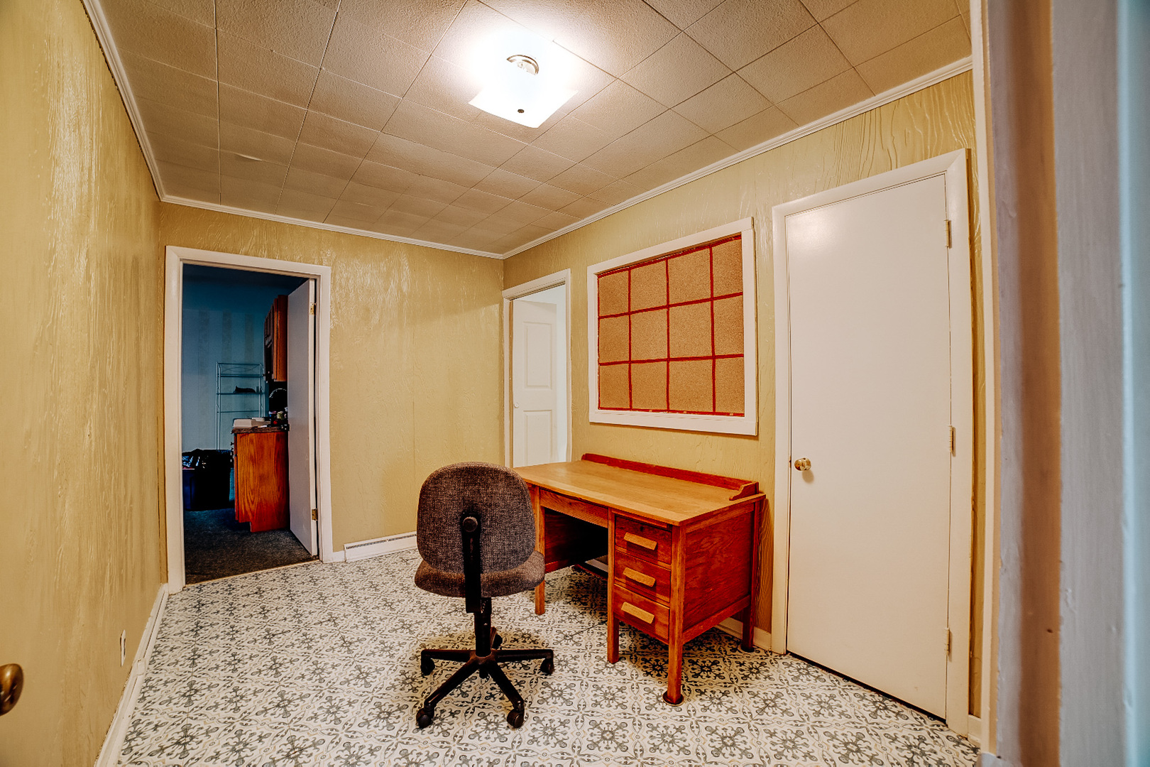 602 East Cherry Street Watseka, IL 60970 - Photo 23 of 29 a view of a workspace with furniture and a window
