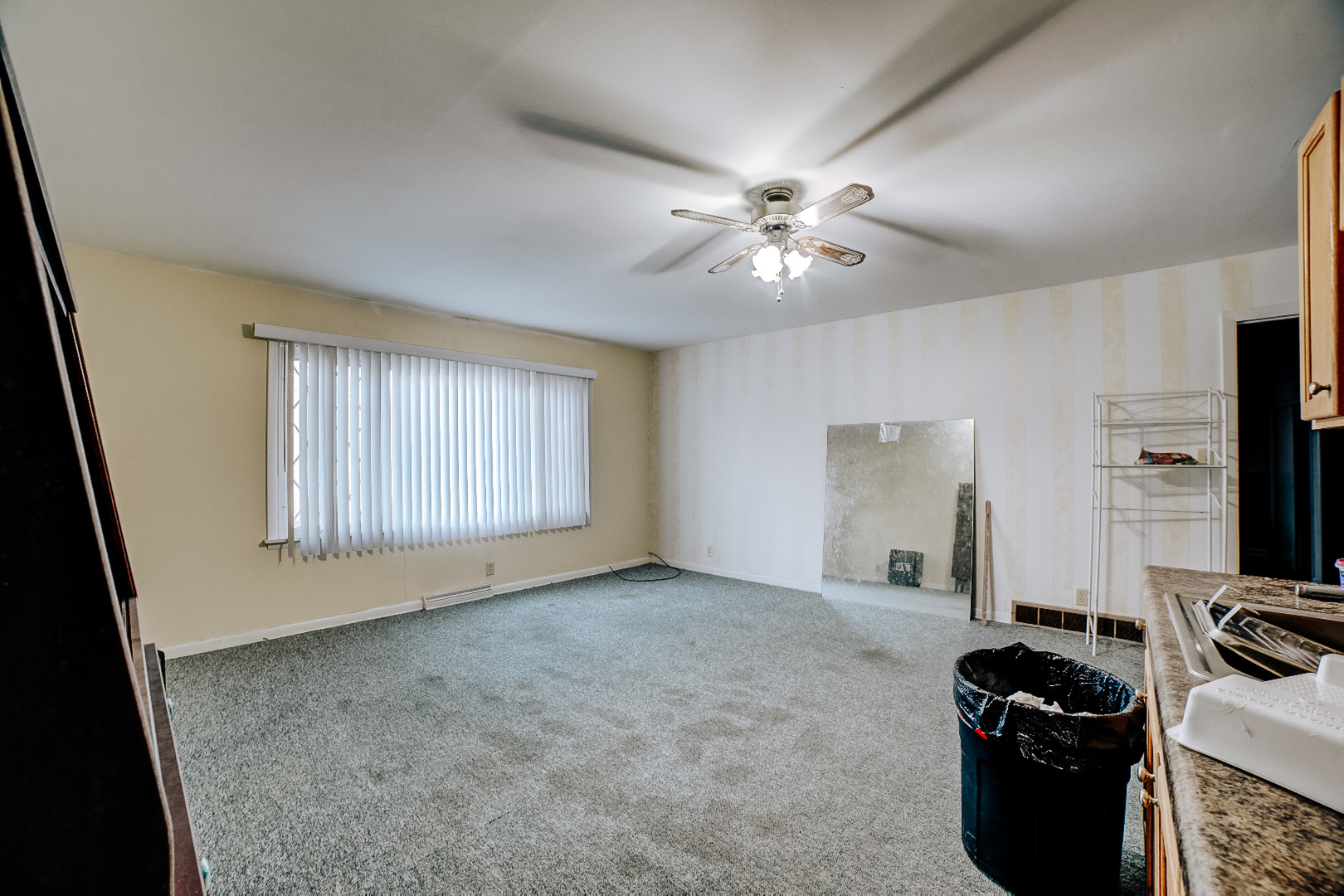 602 East Cherry Street Watseka, IL 60970 - Photo 25 of 29 wooden floor in an empty room with a window