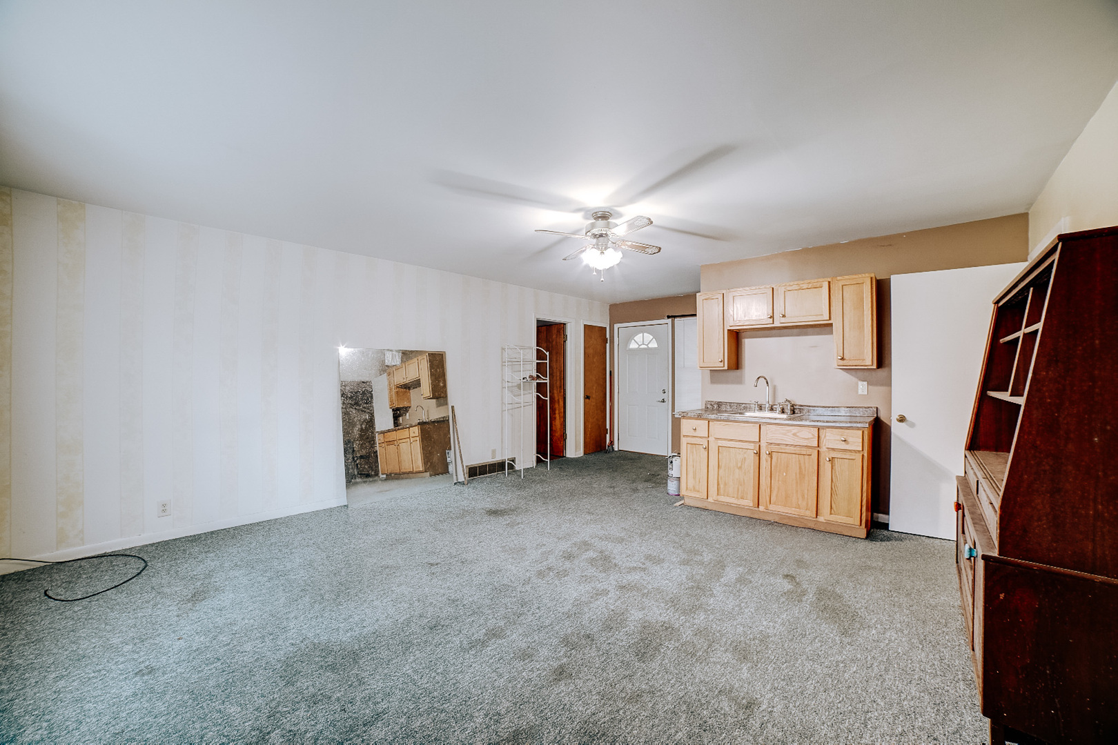 602 East Cherry Street Watseka, IL 60970 - Photo 26 of 29 a view of a kitchen with a sink and a refrigerator