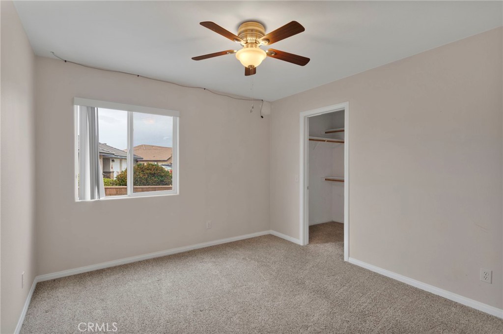 13934 Okesa Road Apple Valley, CA 92307 - Photo 15 of 34 a view of an empty room with a window