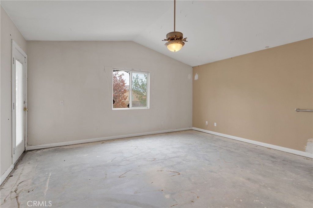 13934 Okesa Road Apple Valley, CA 92307 - Photo 24 of 34 an empty room with windows