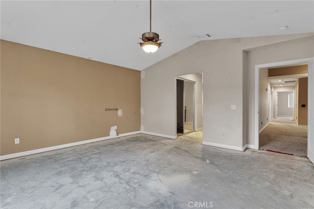 13934 Okesa Road Apple Valley, CA 92307 - Photo 25 of 34 a view of a livingroom with a chandelier fan