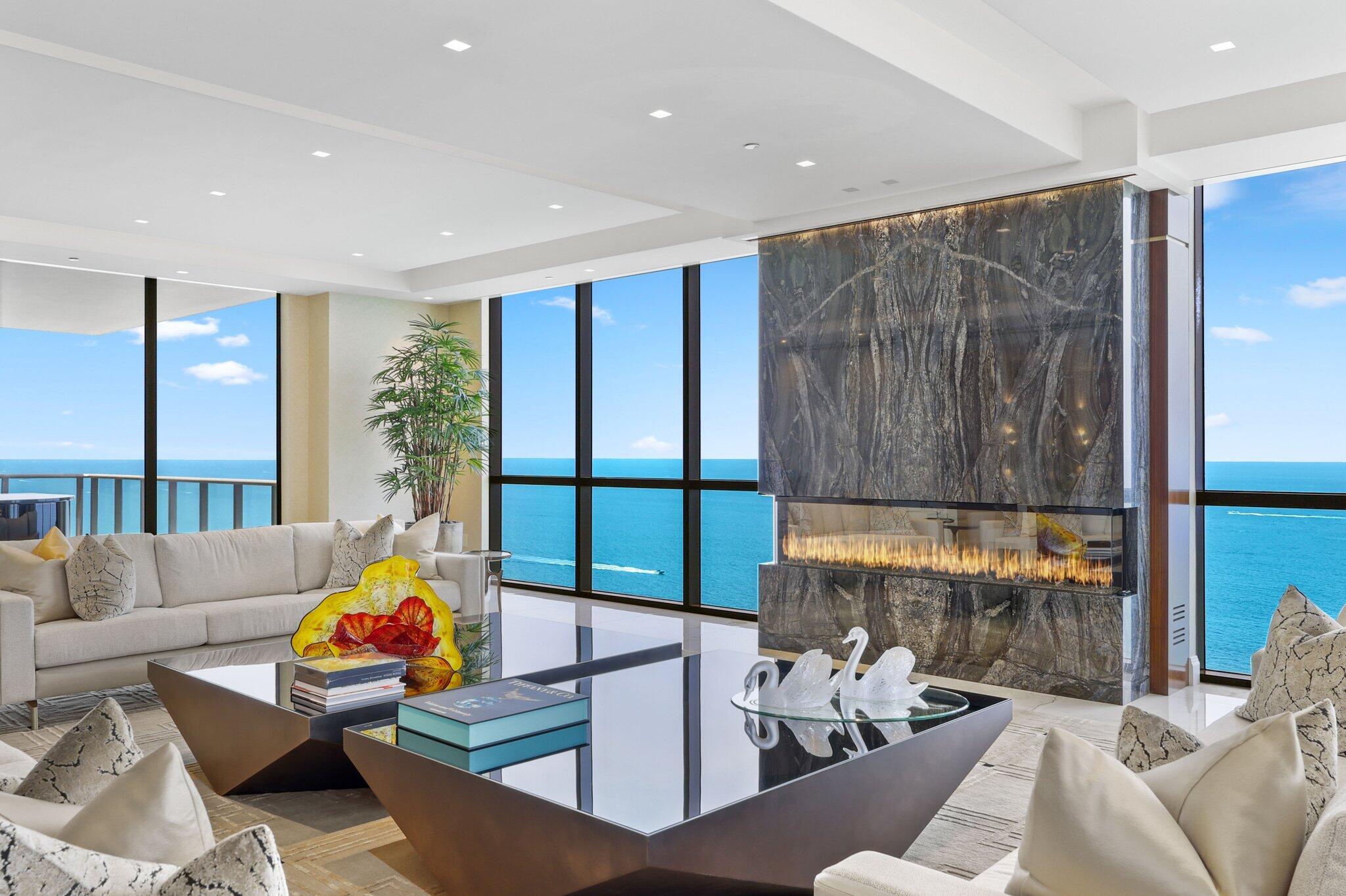 17749 Collins Avenue, Unit TS 3901/3902 Sunny Isles Beach, FL 33160 - Photo 2 of 127 a living room with furniture and a window