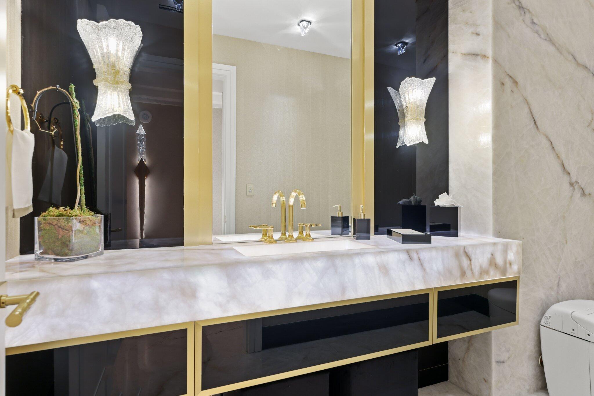 17749 Collins Avenue, Unit TS 3901/3902 Sunny Isles Beach, FL 33160 - Photo 36 of 127 a bathroom with a granite countertop sink and a mirror