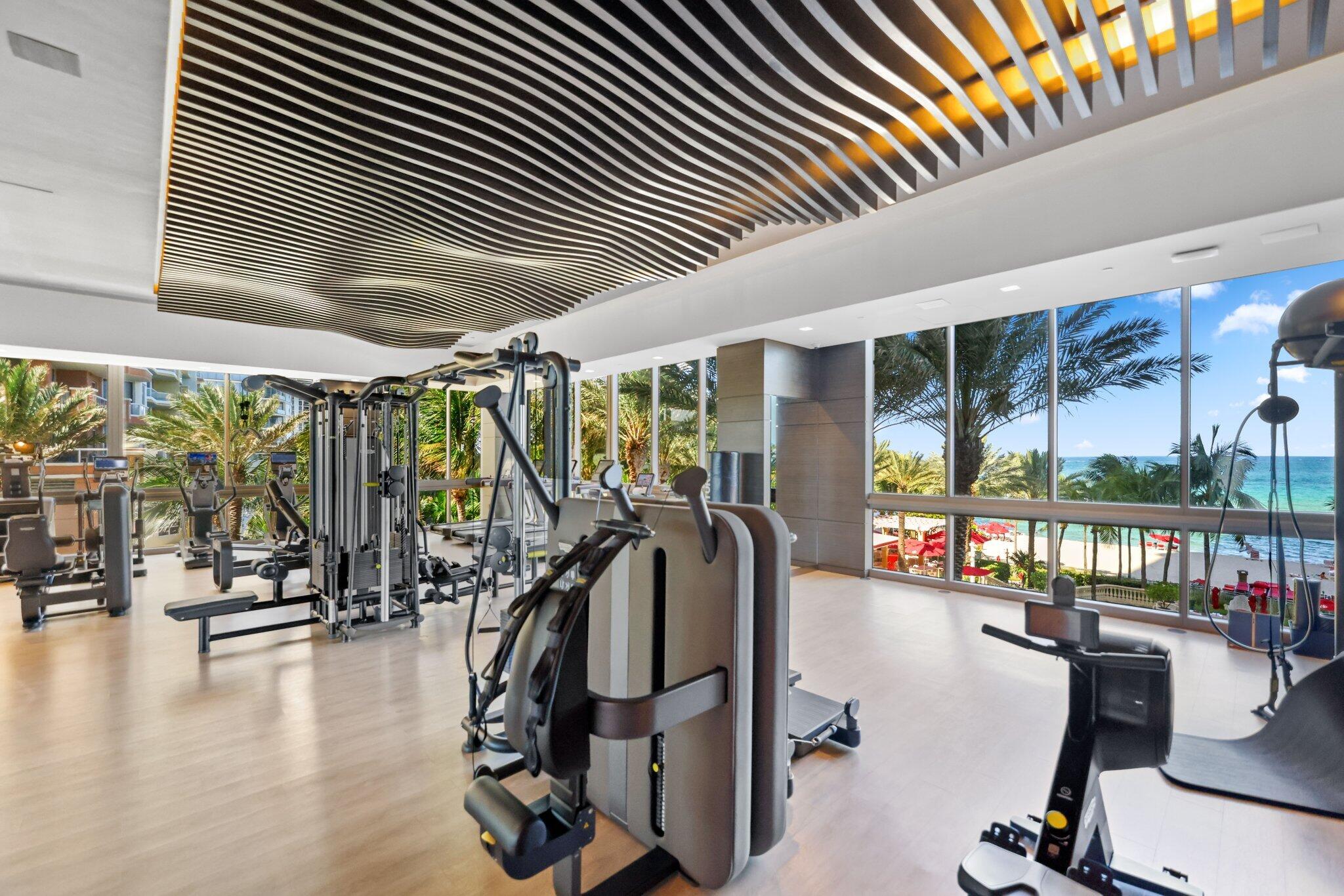 17749 Collins Avenue, Unit TS 3901/3902 Sunny Isles Beach, FL 33160 - Photo 94 of 127 a view of a room with gym equipment