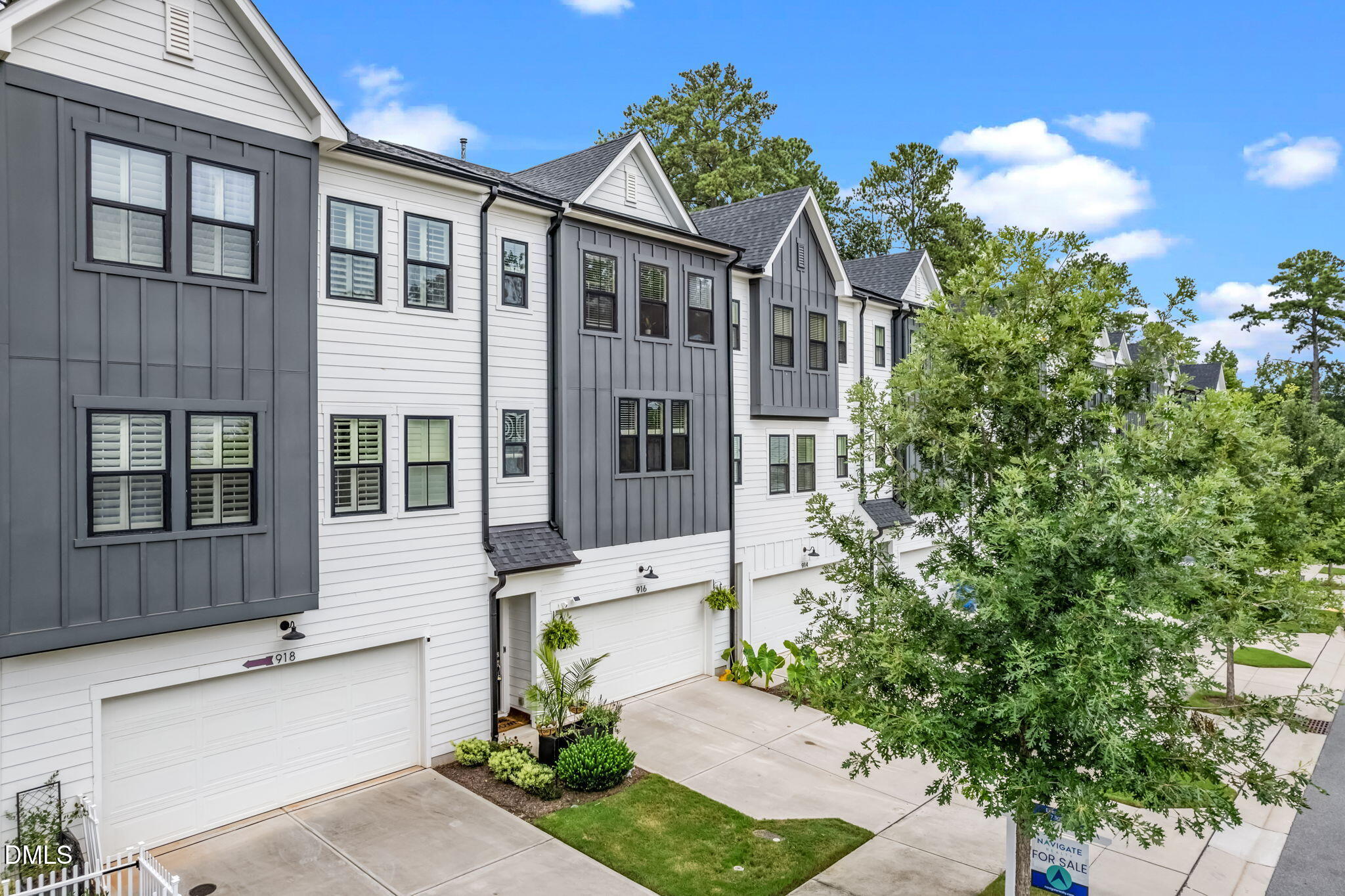 916 Waterside View Drive Raleigh, NC 27606 - Photo 2 of 22 a front view of a house with a yard