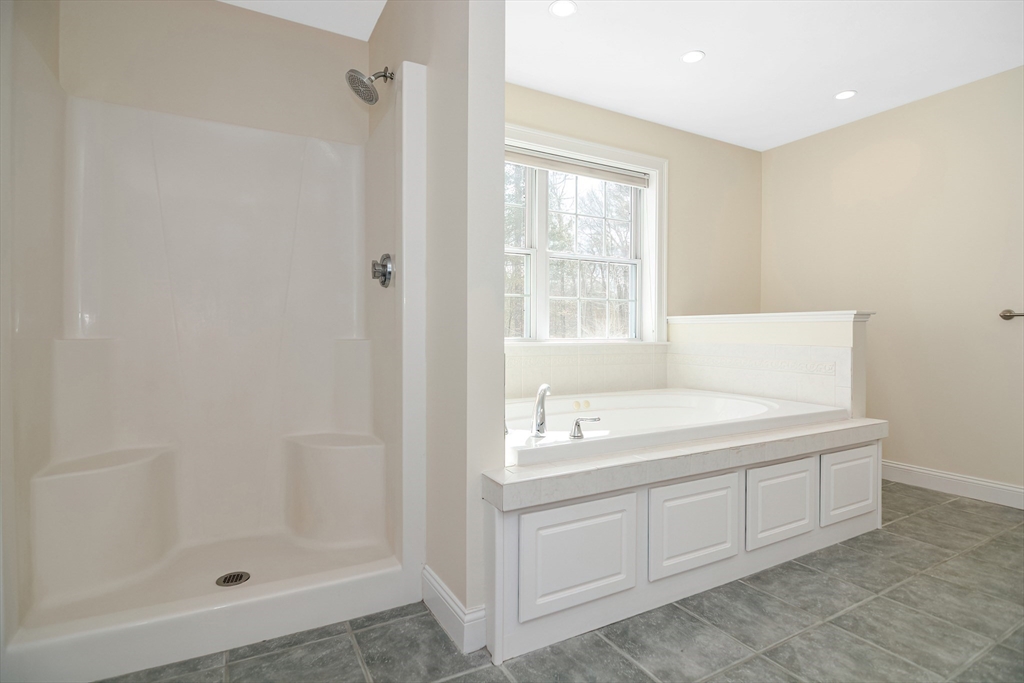 268 Hall Street Dunstable, MA 01827 - Photo 18 of 36 a bathroom with a sink a vanity and a shower
