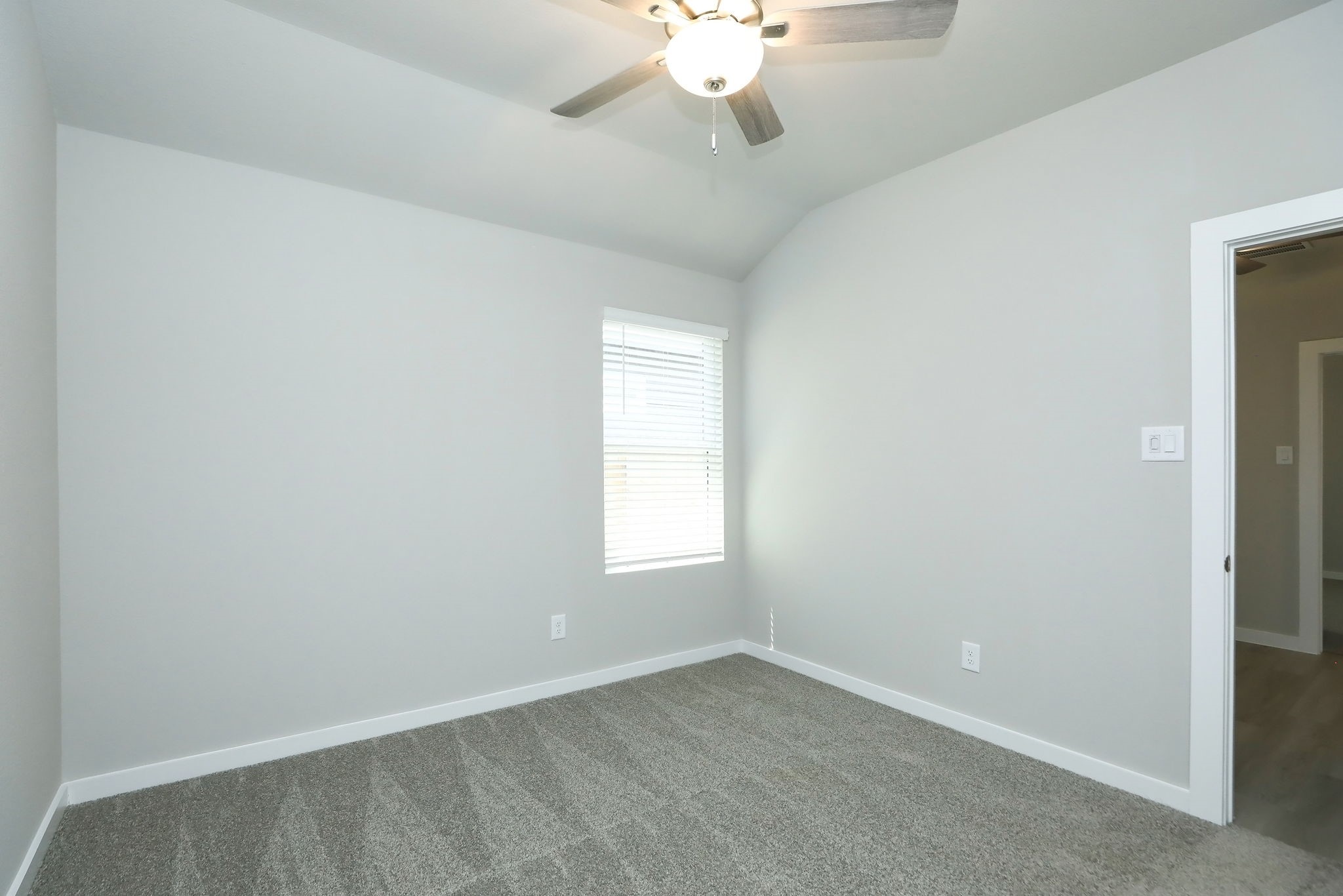 14110 Greystone Ter Street Magnolia, TX 77354 - Photo 15 of 34 Secondary Bedroom #2 Is Located On The Other Side Of The Bonus Room. Please Note That Each Bedroom, The Bonus Room, And The Family Room All Offer Ceiling Fans. Again, The Same Style Of Fan In Each Of Those Spaces Further Enhances The Flow Of The Home.