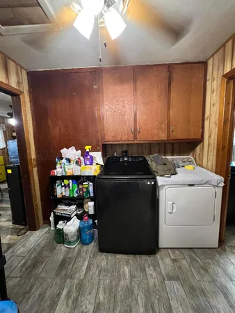 a utility room with washer and dryer