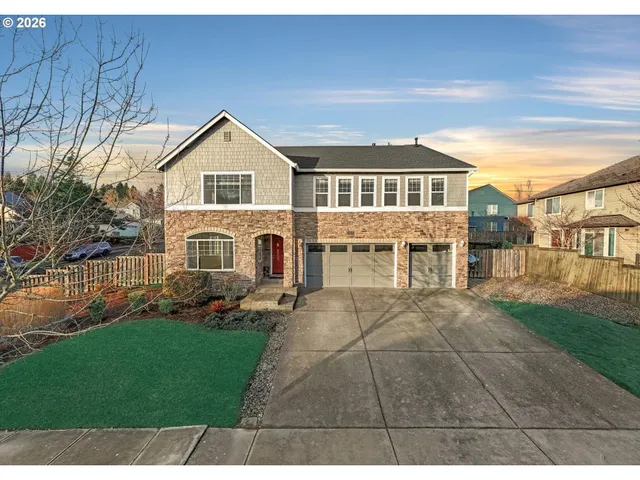 a view of house with yard