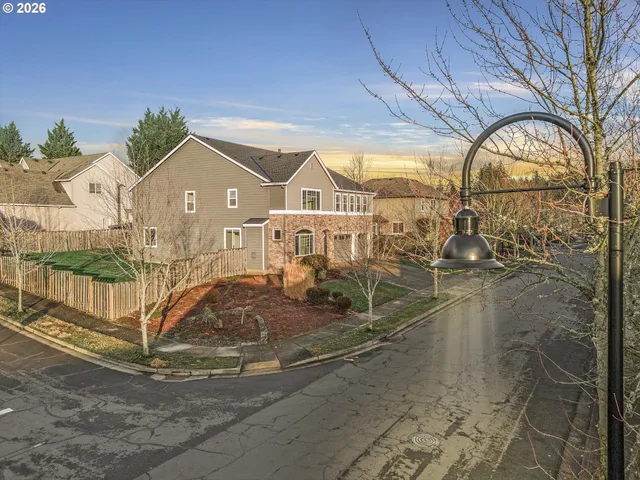 a view of a house with a park