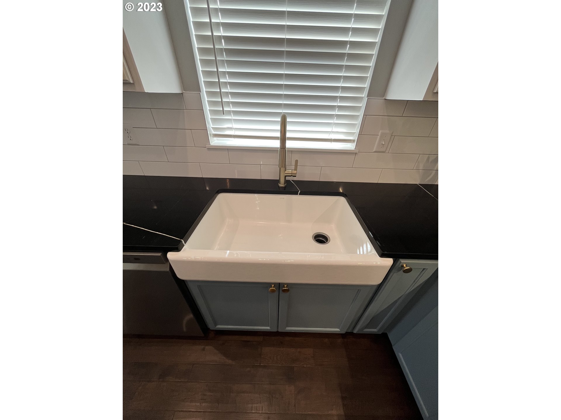 1062 B Street Springfield, OR 97477 - Photo 11 of 33 a white sink sitting under a bathroom window