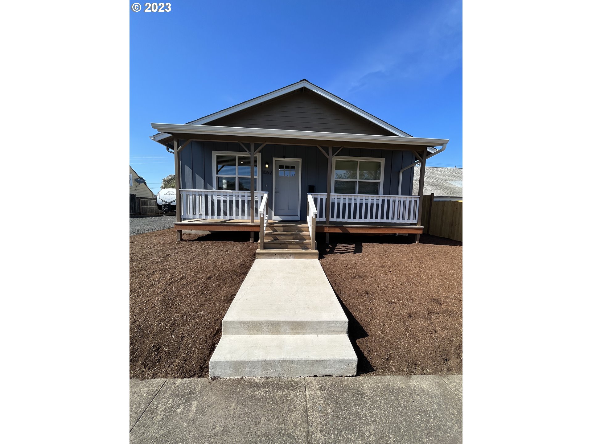 1062 B Street Springfield, OR 97477 - Photo 2 of 33 a front view of a house with a yard
