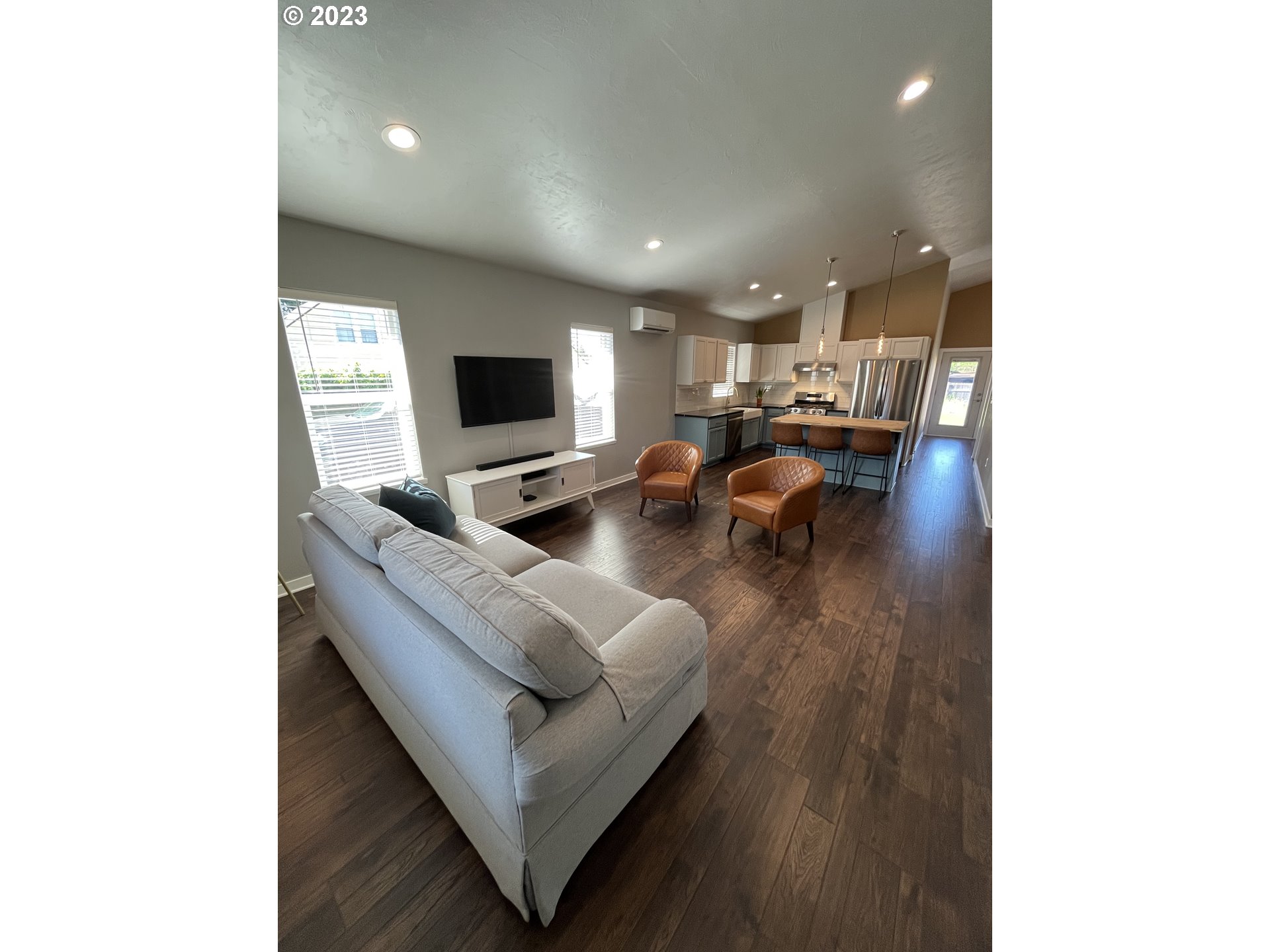 1062 B Street Springfield, OR 97477 - Photo 3 of 33 a living room with furniture and a flat screen tv
