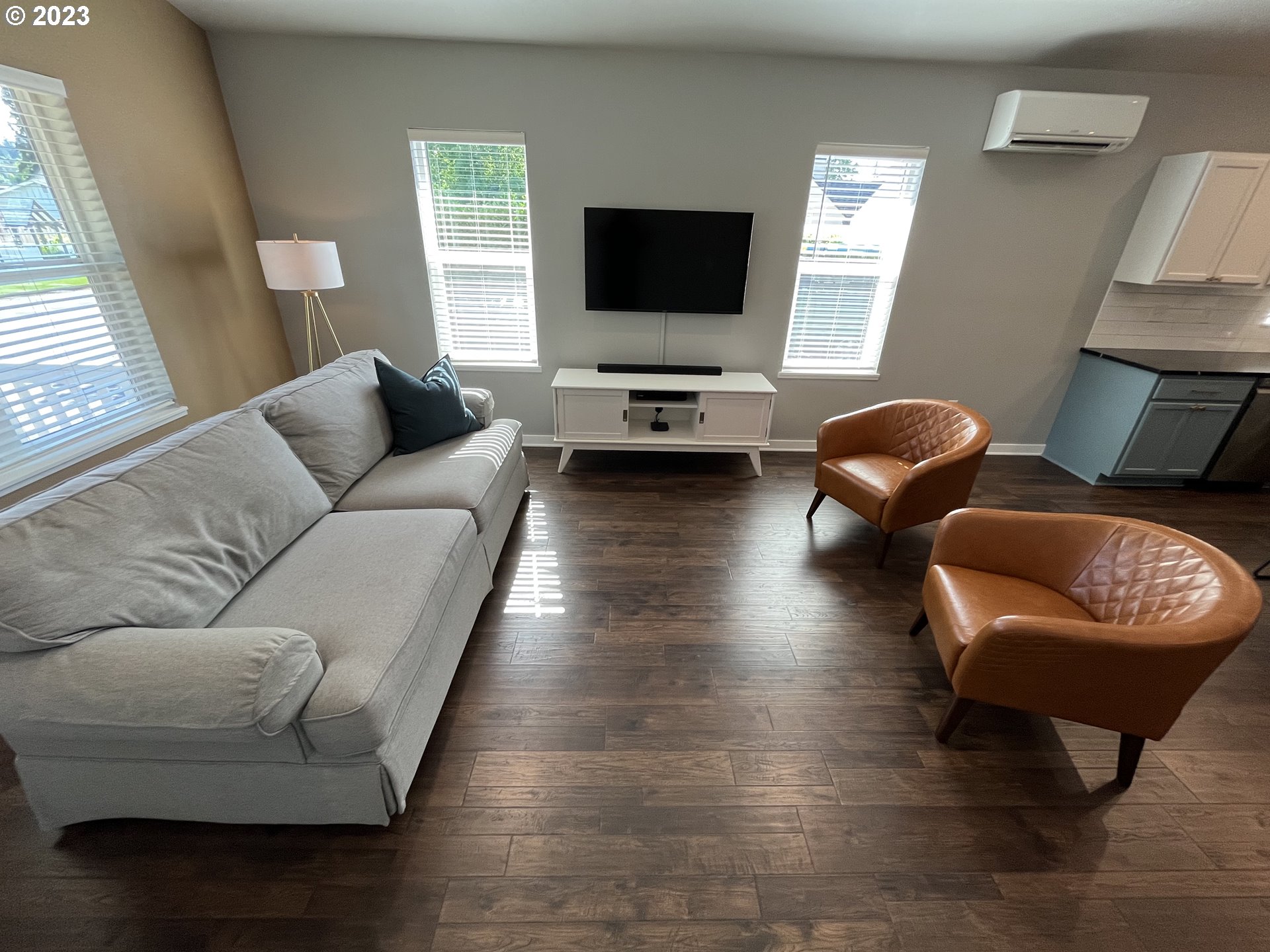 1062 B Street Springfield, OR 97477 - Photo 4 of 33 a living room with furniture and a flat screen tv