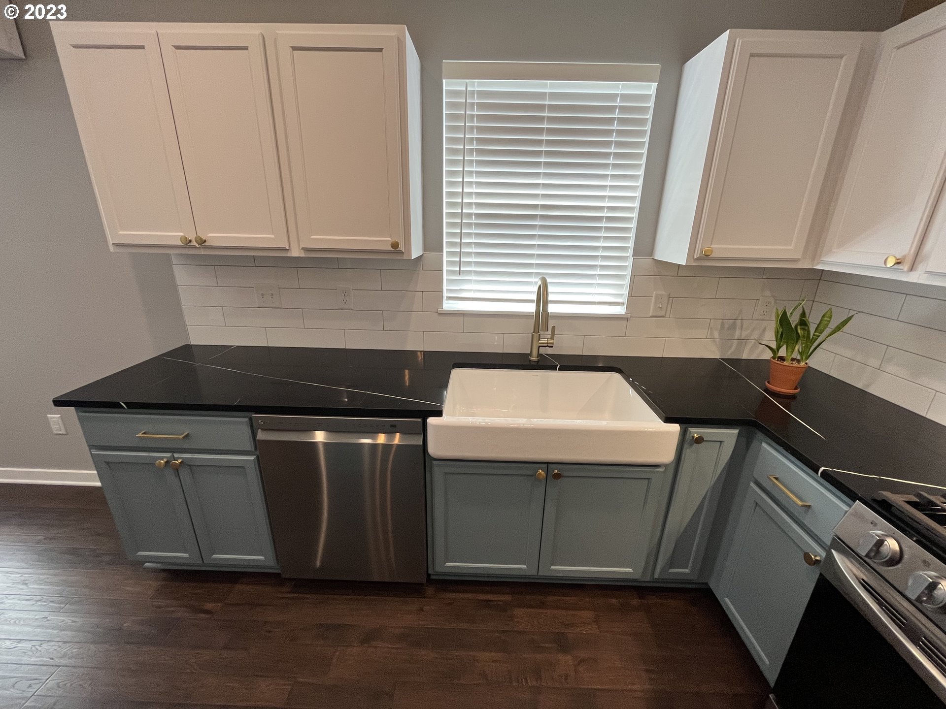 1062 B Street Springfield, OR 97477 - Photo 10 of 33 a kitchen with a sink and cabinets