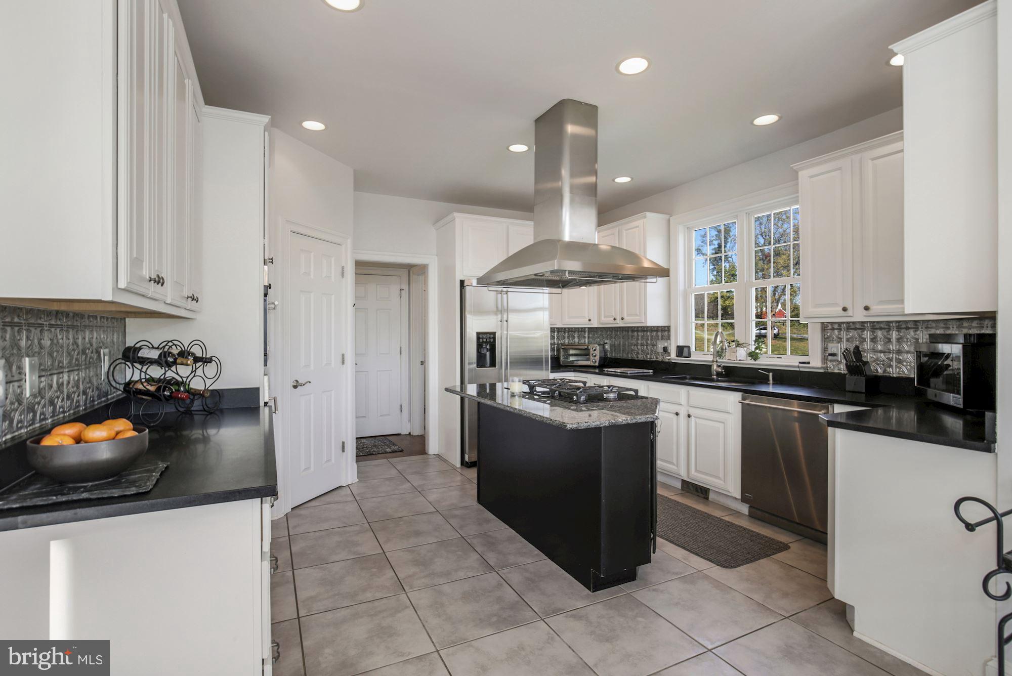 33415 Austin Grove Road Bluemont, VA 20135 - Photo 22 of 58 Granite counter, SS appliances, gas cooktop