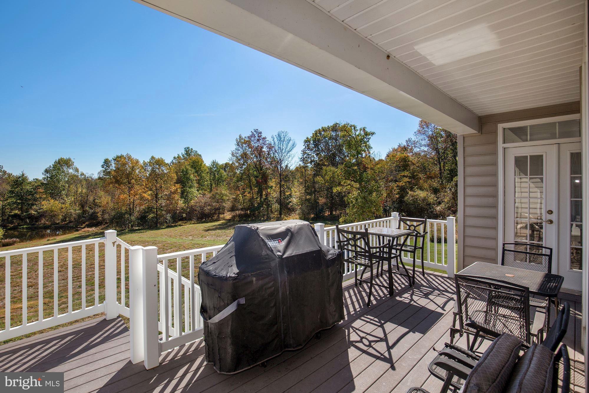 33415 Austin Grove Road Bluemont, VA 20135 - Photo 36 of 58 View from back deck overlooks the pond lawn/ woods