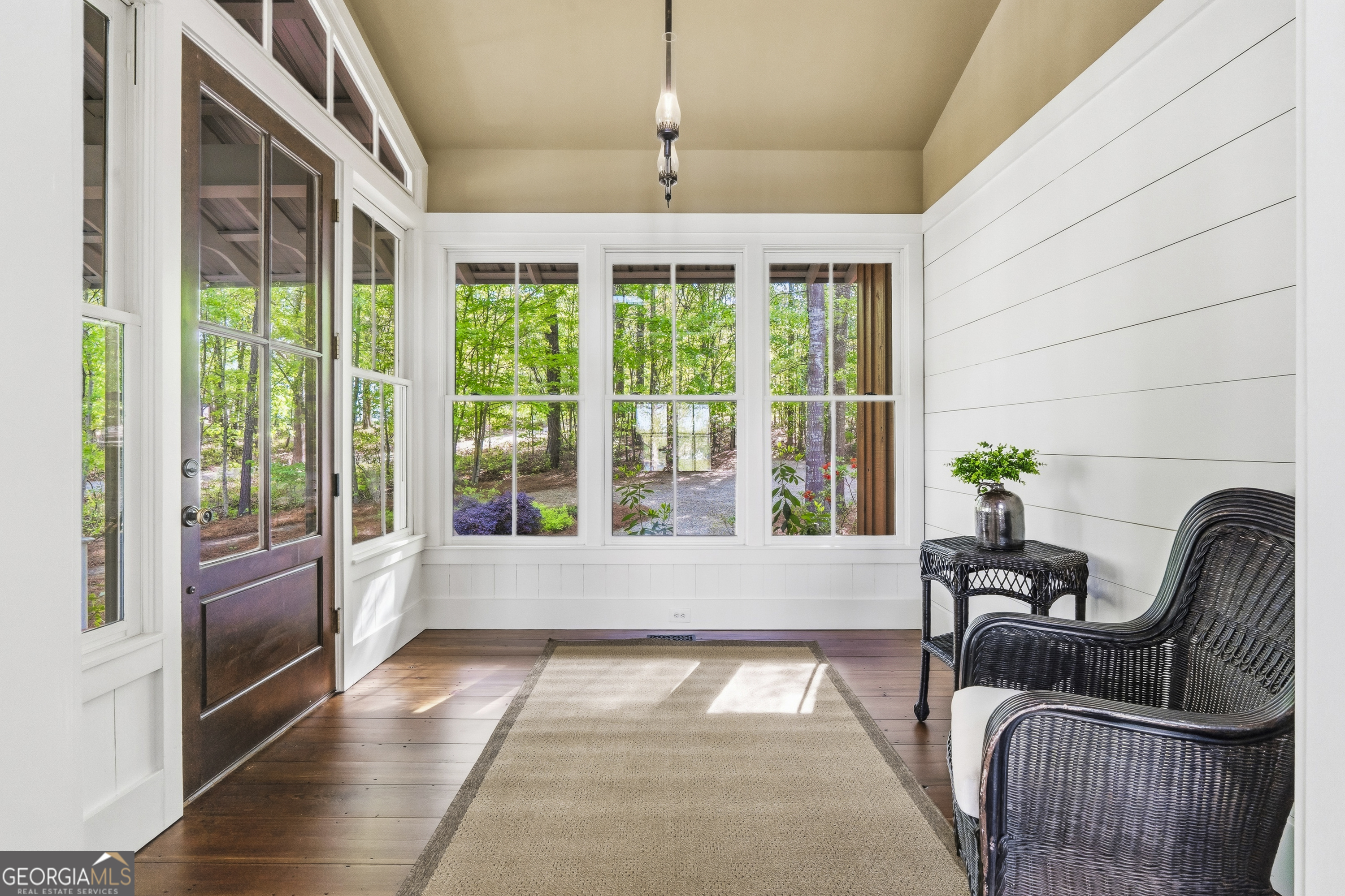 57 Birch Lane Sparta, GA 31087 - Photo 12 of 61 a living room with furniture and floor to ceiling windows