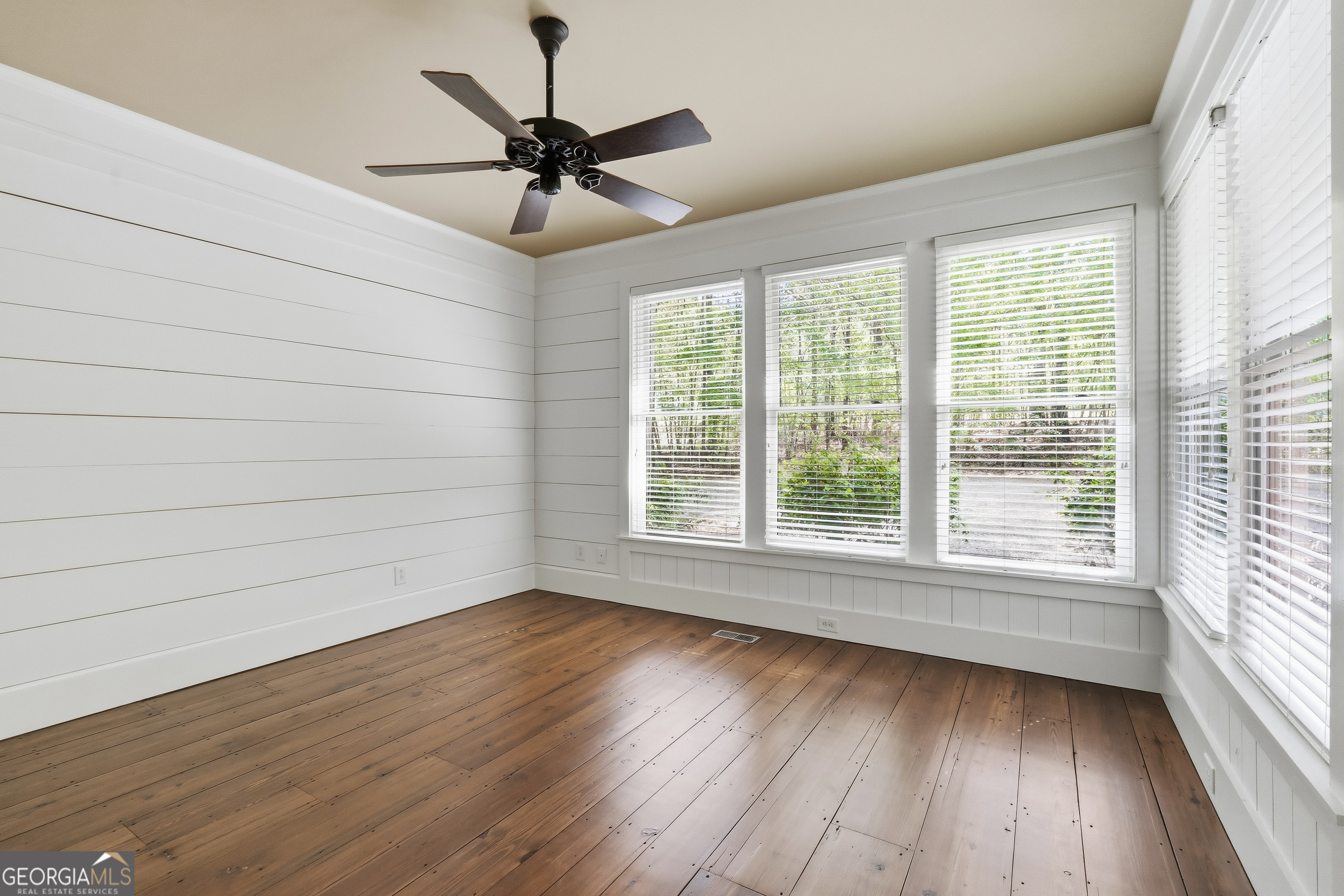 57 Birch Lane Sparta, GA 31087 - Photo 28 of 61 a view of a livingroom with wooden floor and a window