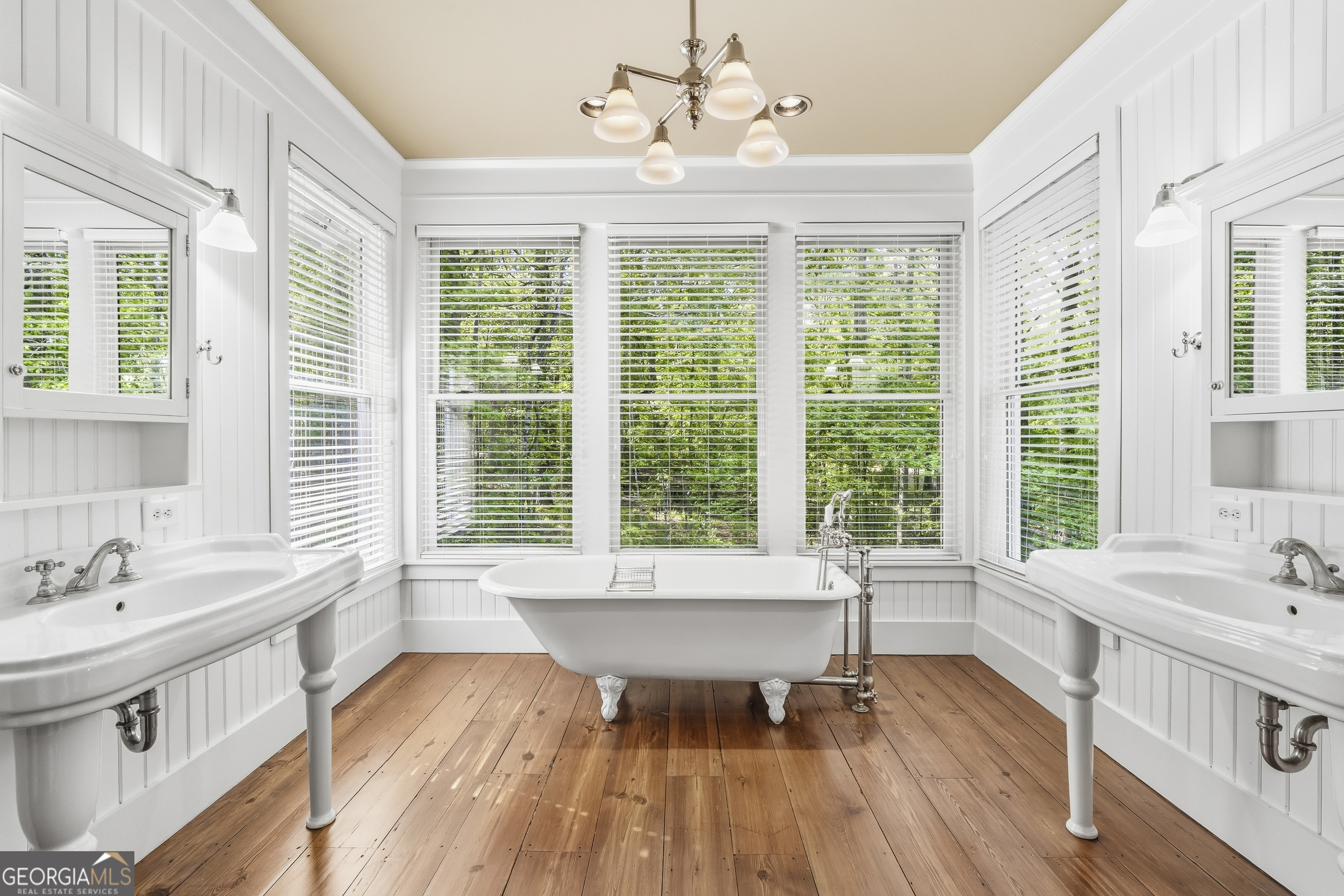 57 Birch Lane Sparta, GA 31087 - Photo 31 of 61 a spacious bathroom with a large window and a bathtub