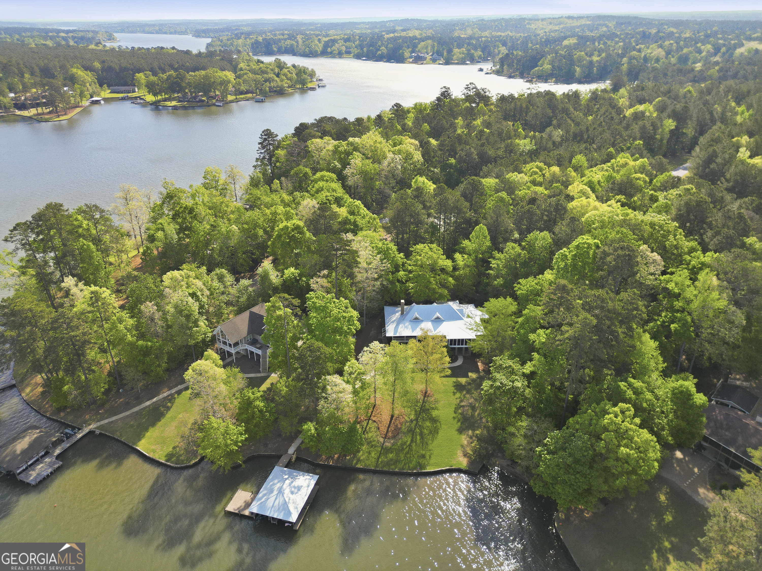 57 Birch Lane Sparta, GA 31087 - Photo 6 of 61 an aerial view of a houses with a lake view