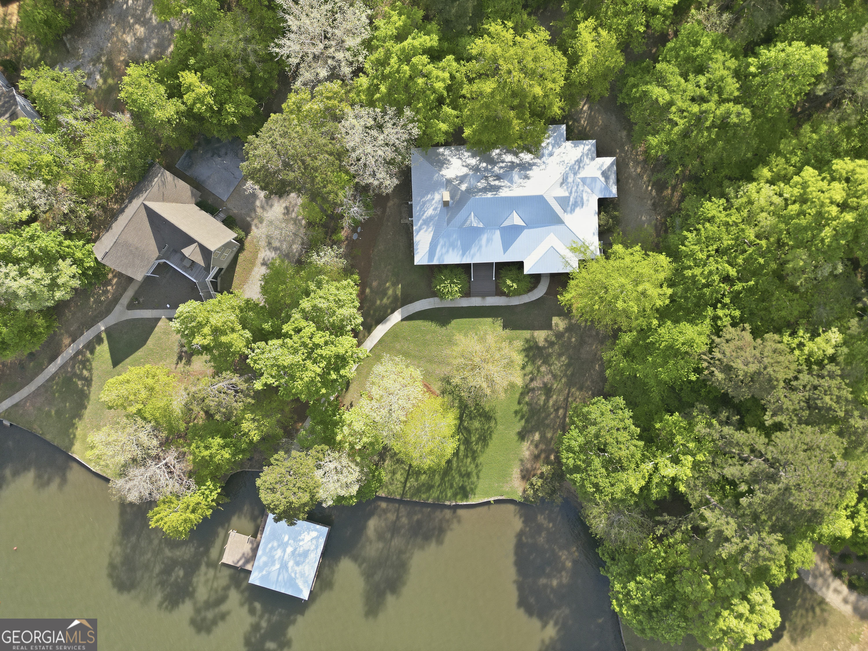 57 Birch Lane Sparta, GA 31087 - Photo 7 of 61 an aerial view of a house with a yard and lake view