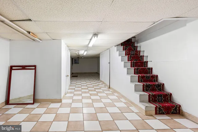 a view of a storage & utility room with a window