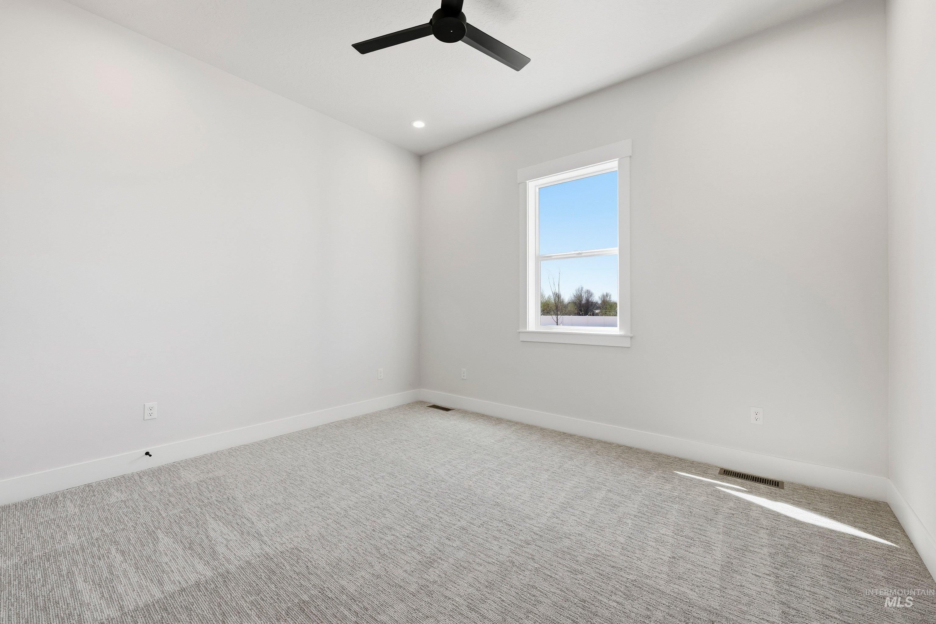 24897 Ardmore Court Caldwell, ID 83607 - Photo 32 of 47 Spare room with carpet, ceiling fan, and recessed lighting