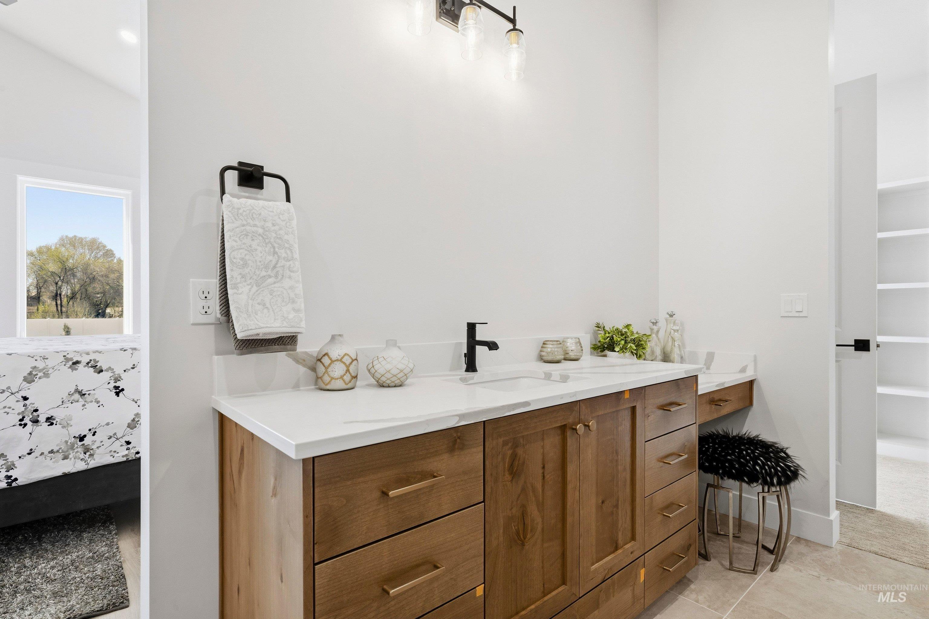 24897 Ardmore Court Caldwell, ID 83607 - Photo 39 of 47 Full bath featuring vanity and a walk in closet