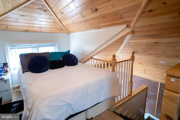 a view of balcony with furniture