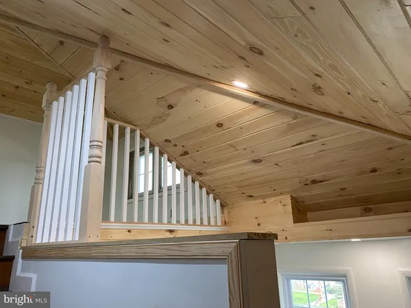 a view of a hallway with a couch
