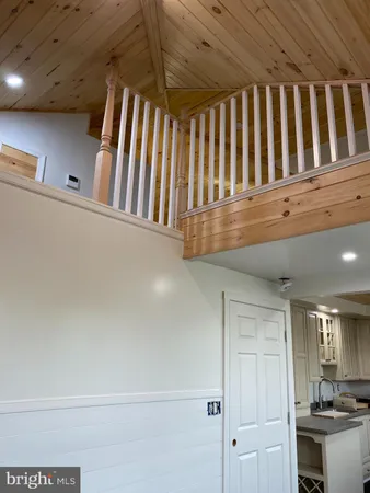 a view of wooden floor and staircase