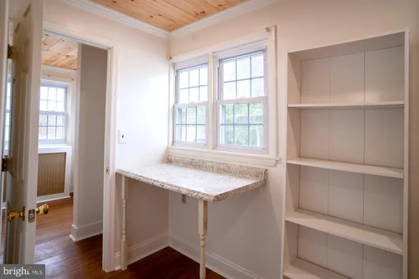 a room with furniture and a fireplace