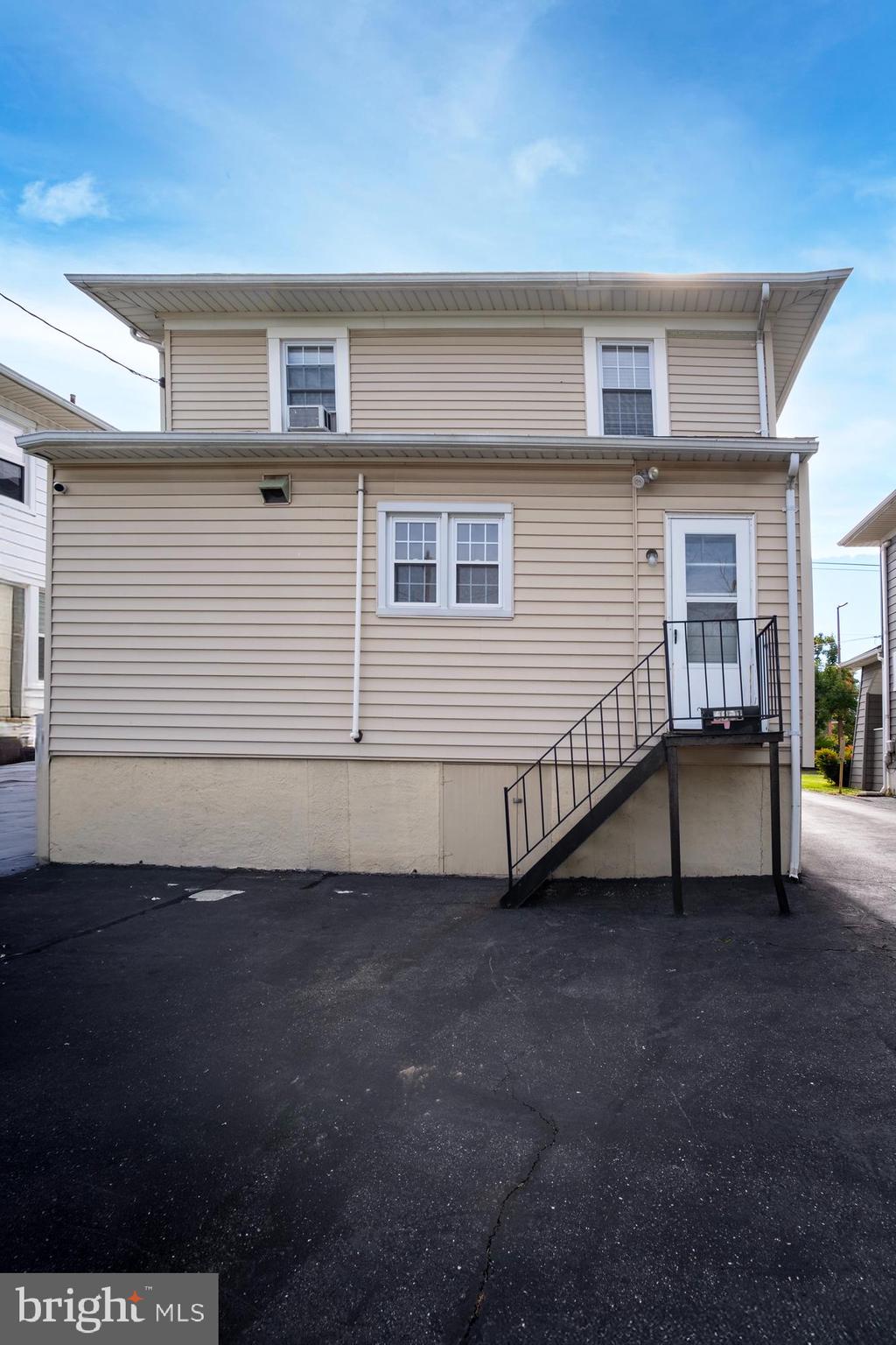 1416 Sulphur Spring Road Halethorpe, MD 21227 - Photo 5 of 42 a view of a house with a balcony