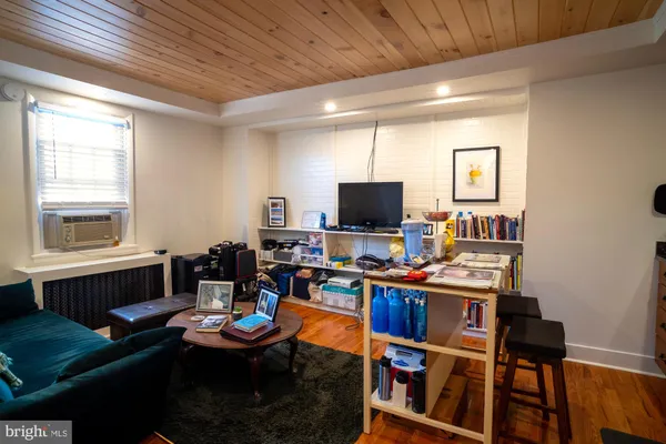 a workspace with furniture and window