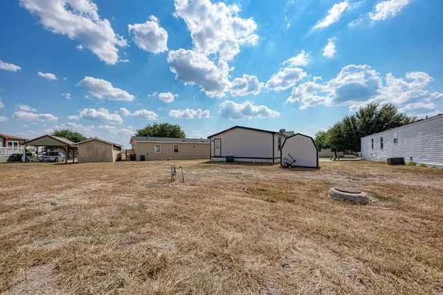 a car parked in front of a house