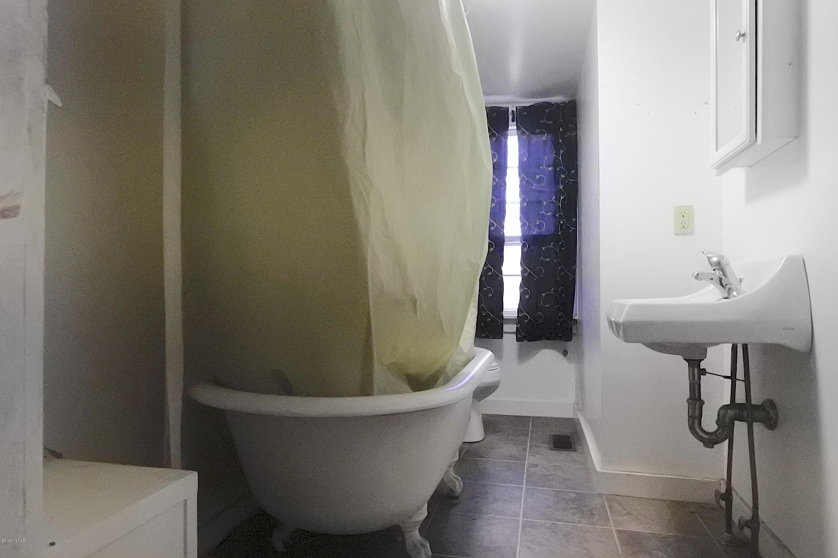 6 West Stockbridge Road Stockbridge, MA 01262 - Photo 12 of 15 a view of a bathtub in a bathroom