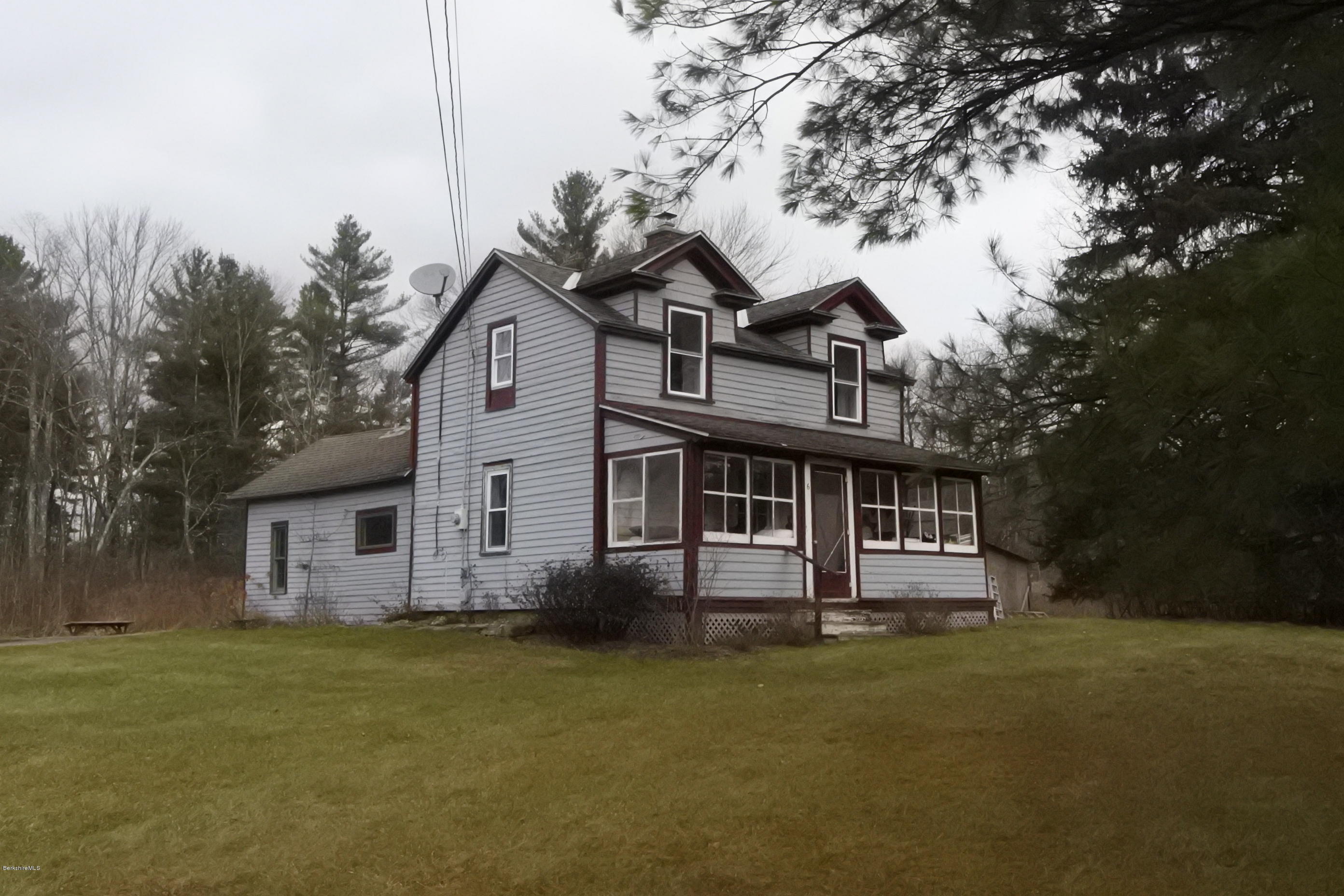 6 West Stockbridge Road Stockbridge, MA 01262 - Photo 14 of 15 a front view of a house with a garden and yard