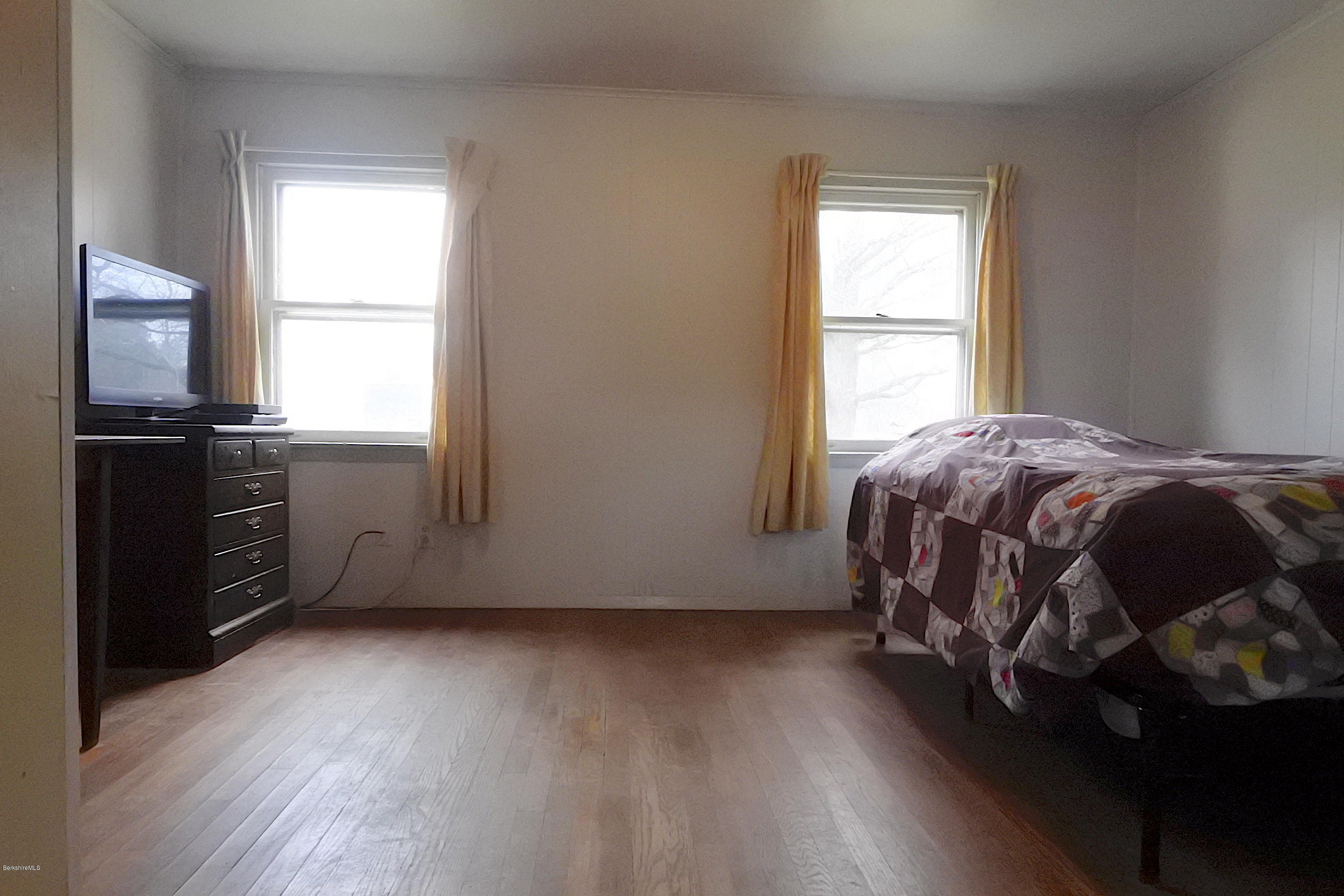 6 West Stockbridge Road Stockbridge, MA 01262 - Photo 6 of 15 a bedroom with a bed and a window