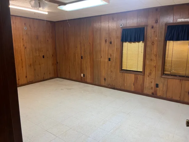 an empty room with windows