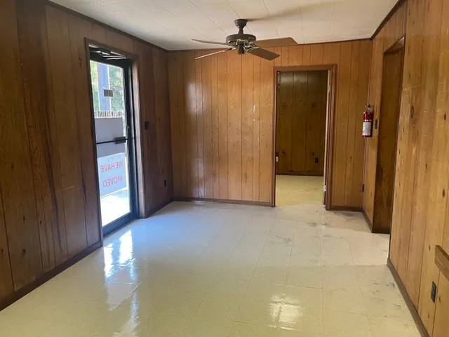 a view of empty room with windows