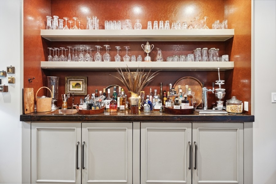 422 Sunset Ridge Road Northfield, IL 60093 - Photo 17 of 52 a kitchen with stainless steel appliances granite countertop a sink and cabinets