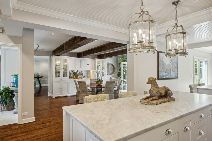 422 Sunset Ridge Road Northfield, IL 60093 - Photo 19 of 52 a kitchen with sink and wooden floor