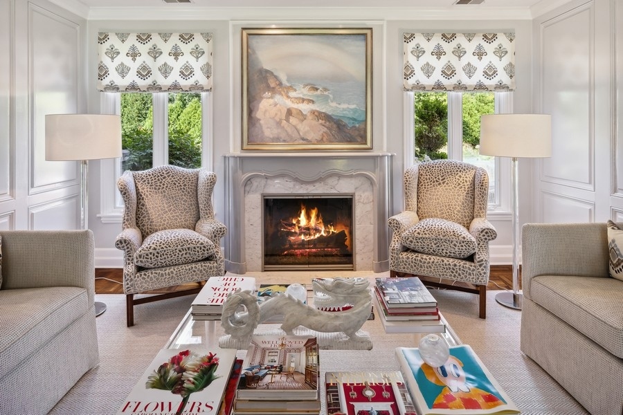 422 Sunset Ridge Road Northfield, IL 60093 - Photo 23 of 52 a living room with furniture and a fireplace